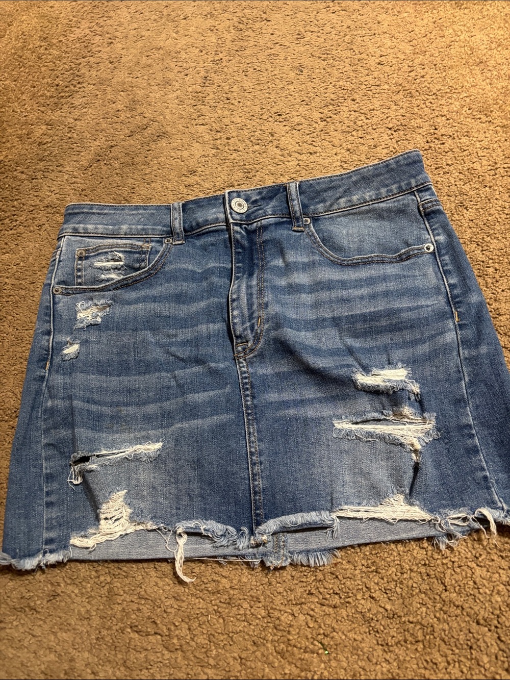 Ripped Blue Denim Mini Skirt